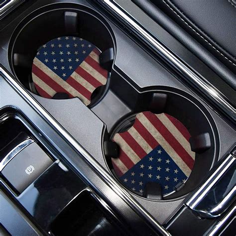 Product Description. Set of 2 absorbent stone car coasters with the C8 Corvette crossed flags and signature. Fits most auto cup holders to absorb moisture. Easily removed for cleaning. 2-5/8” diameter. C8 Corvette Enthusiast Must-Have: If you're a proud owner of the C8 Corvette, these cup holder inserts are a must-have addition to …